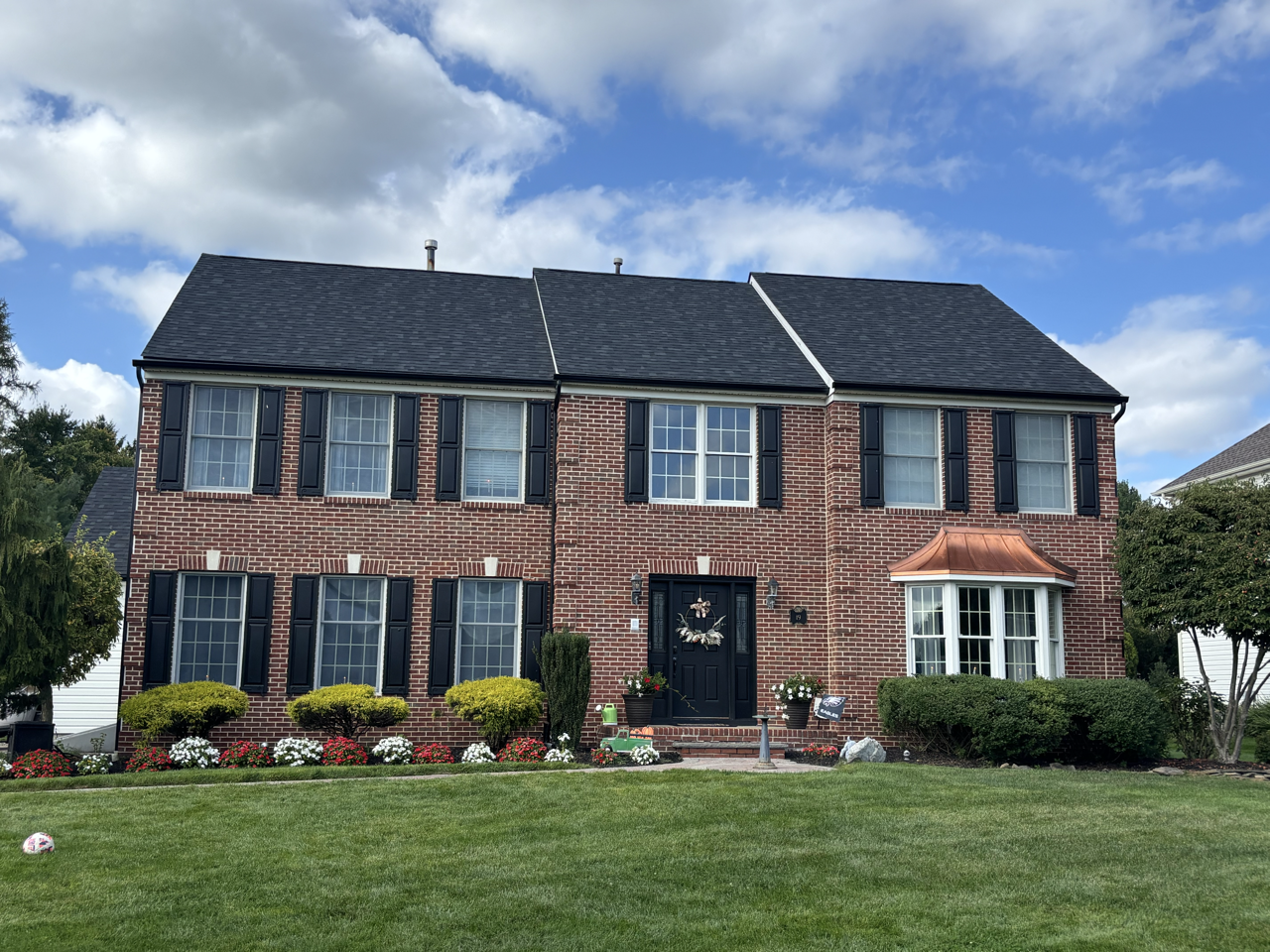 Replacement window installation by Mainline Roofing & Siding