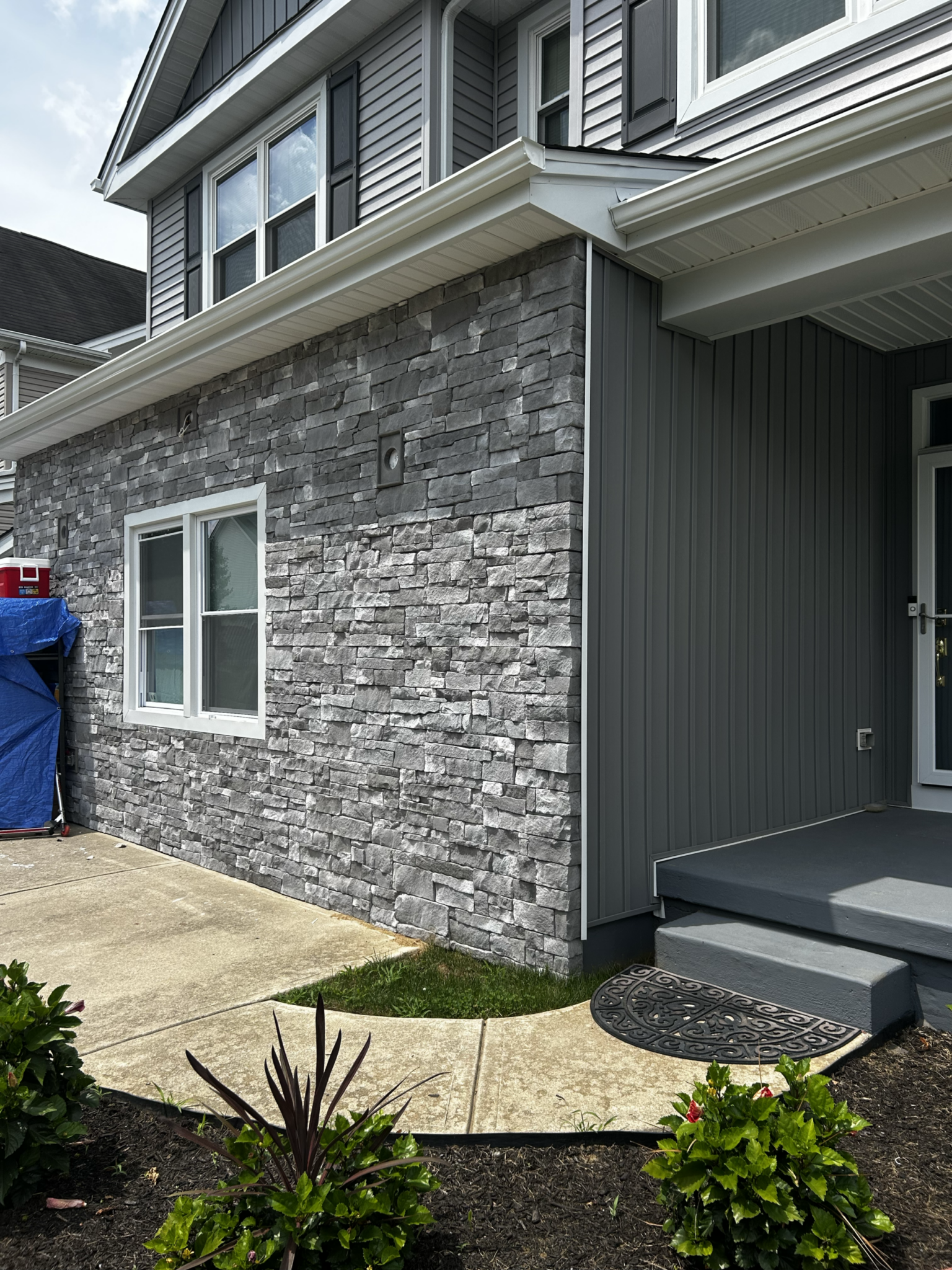 Concrete and hardscape work by Mainline Roofing & Siding